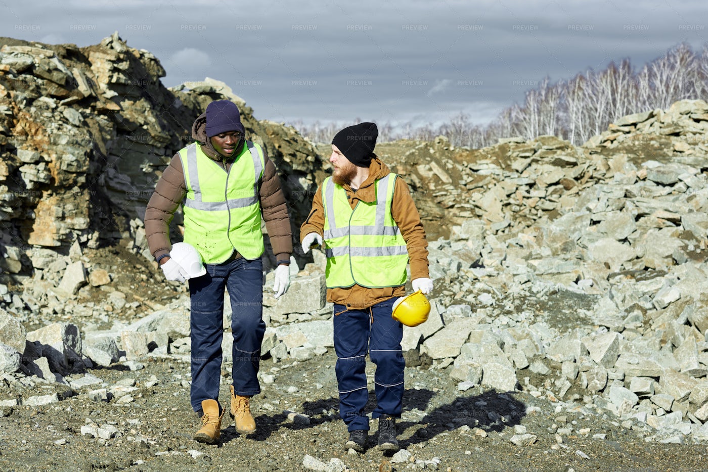 Workers Walking On Site In Alaska: Stock Photos