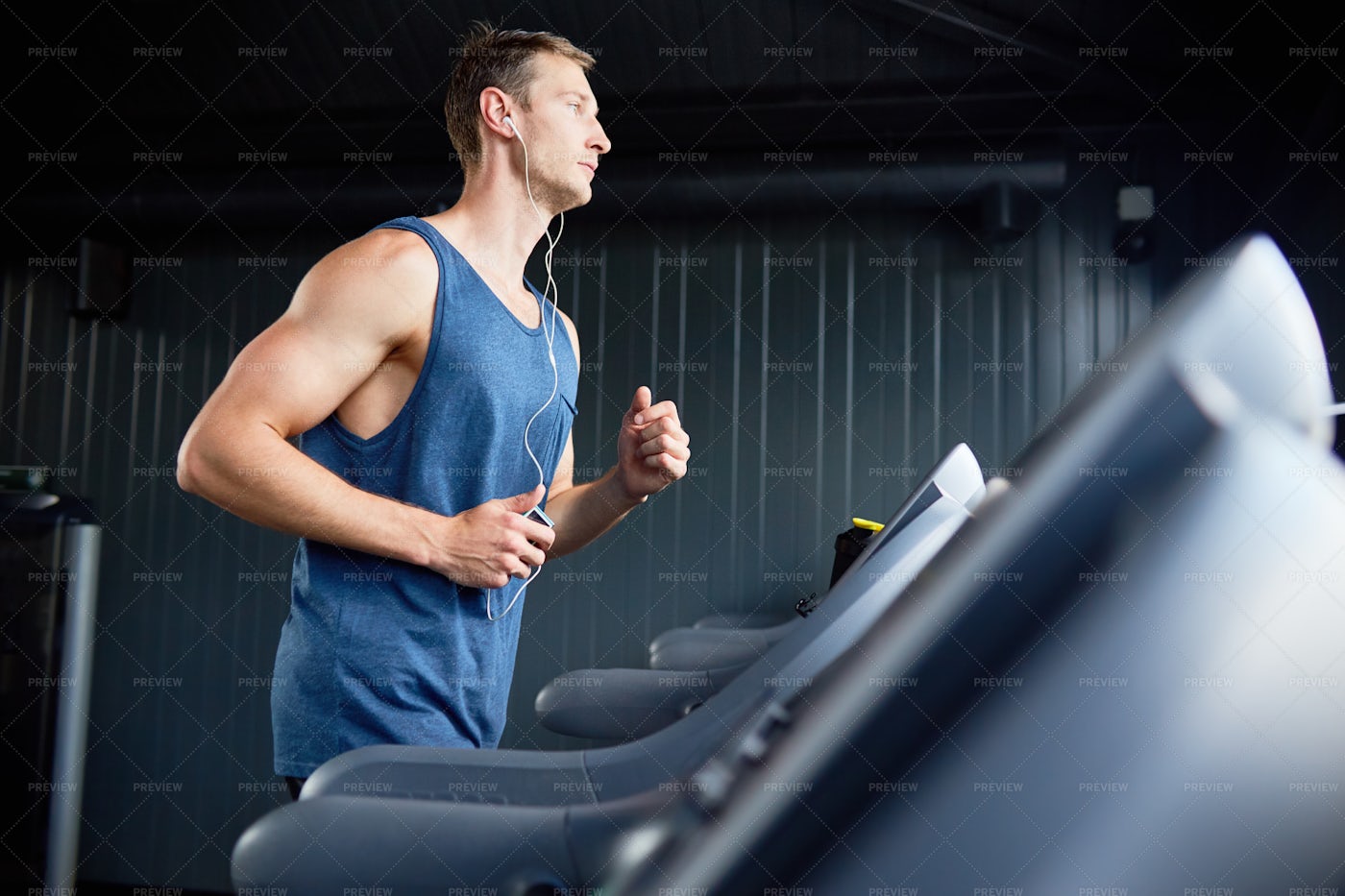 Runner Training In Gym: Stock Photos