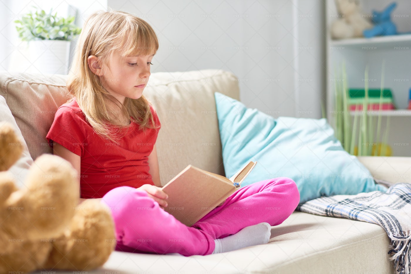 Little Girl Reading Book: Stock Photos