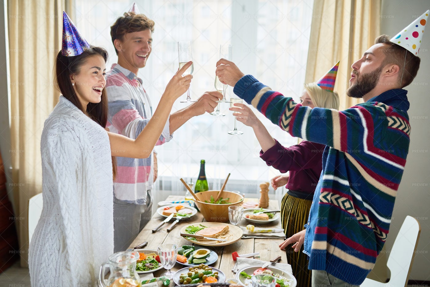 Friends Celebrating Birthday At...: Stock Photos