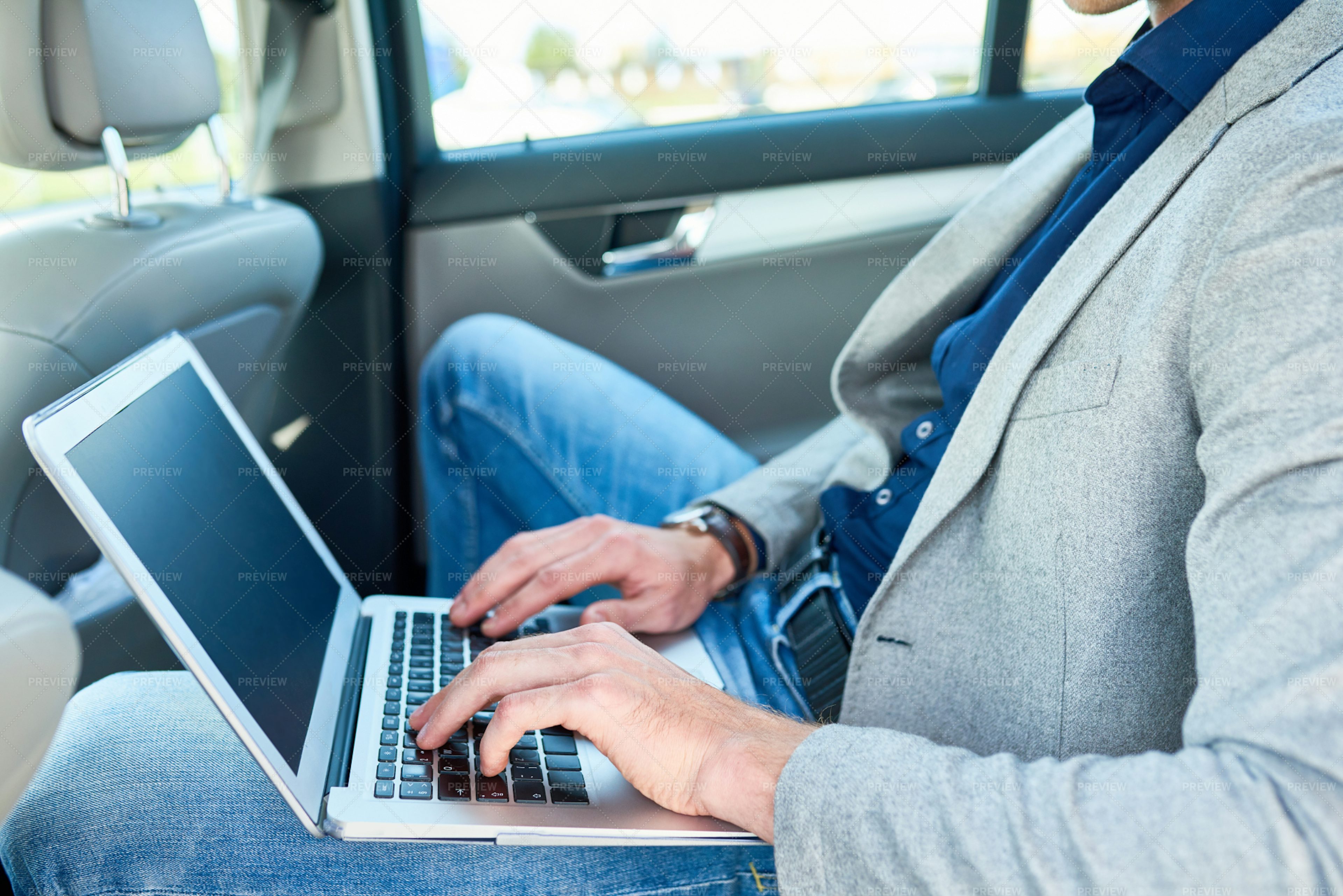 businessman-using-laptop-in-car-stock-photos-motion-array