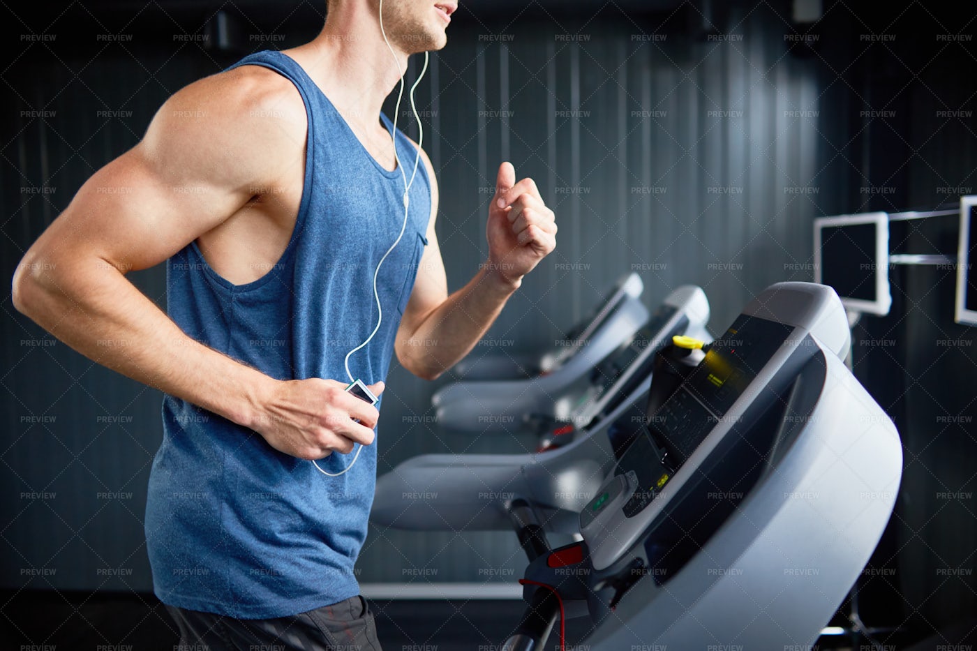 Intensive Workout At Modern Gym: Stock Photos