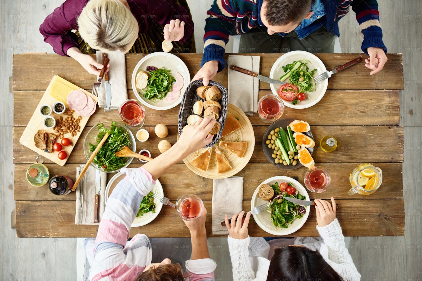 Friends Eating At Dinner Table - Stock Photos | Motion Array