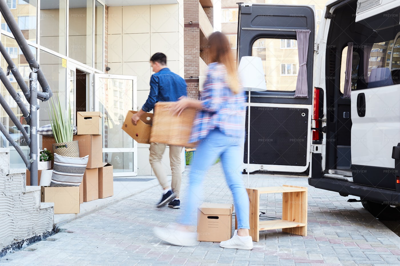 Couple Carrying Boxes: Stock Photos