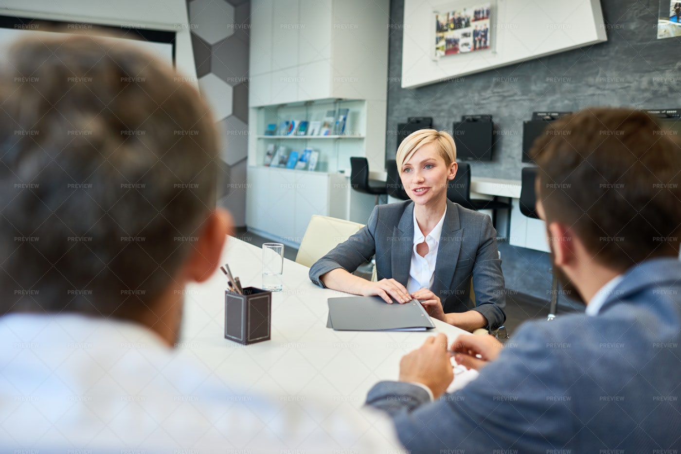 Smiling Business Woman Talking To...: Stock Photos