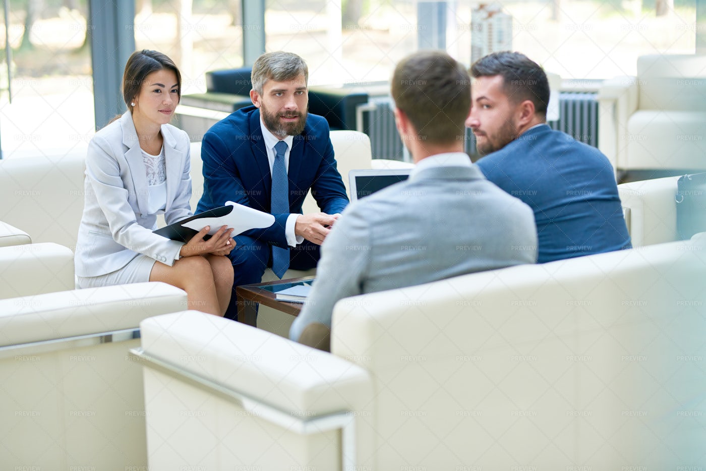 Negotiation Meeting In Office: Stock Photos