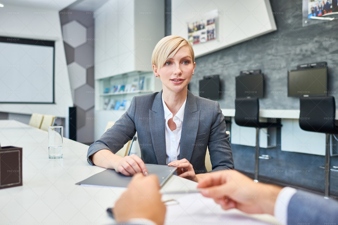 Successful Business Woman Talking To...: Stock Photos