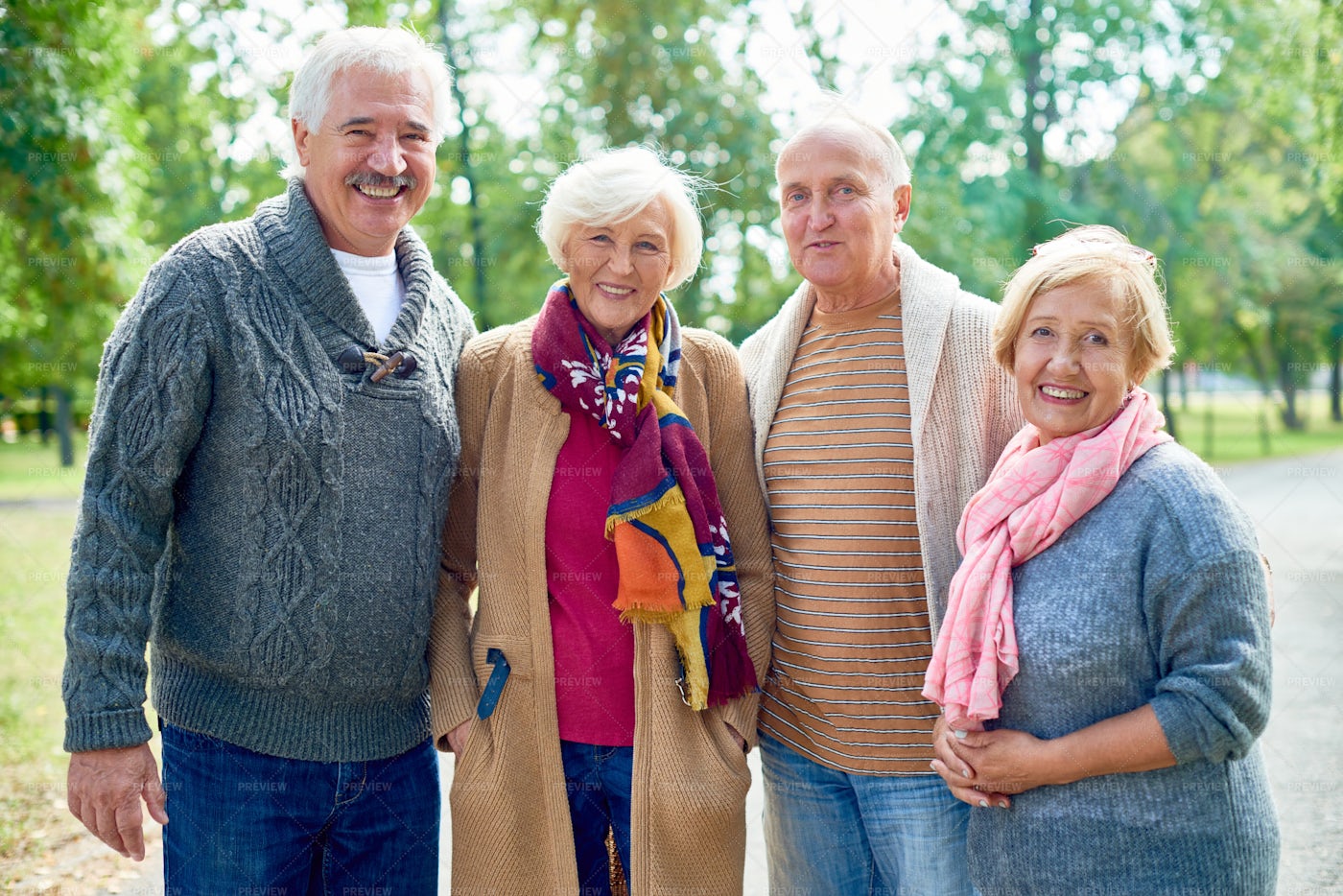 Portrait Of Smiling Senior Friends: Stock Photos