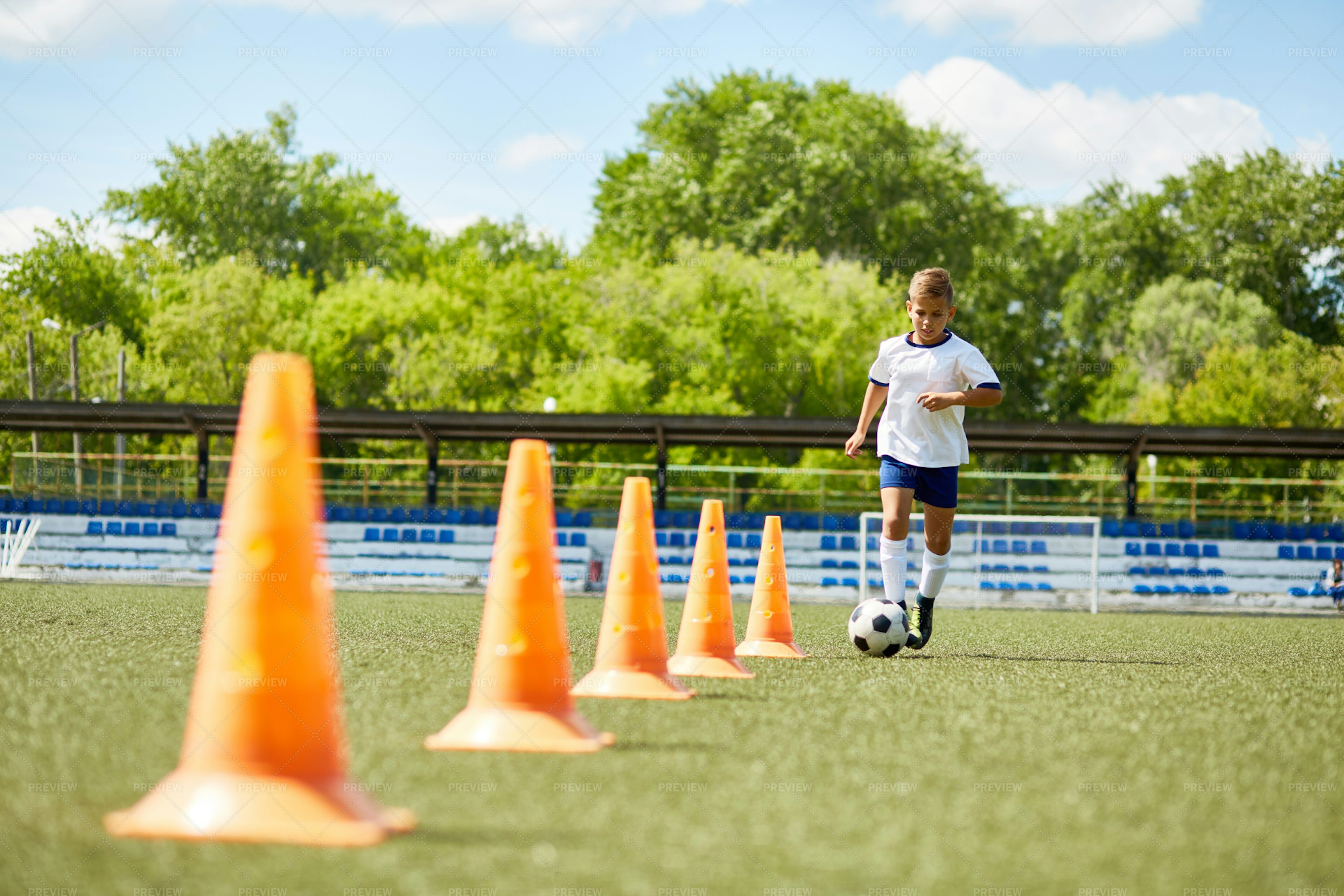 Junior Football Player Practicing... - Stock Photos | Motion Array