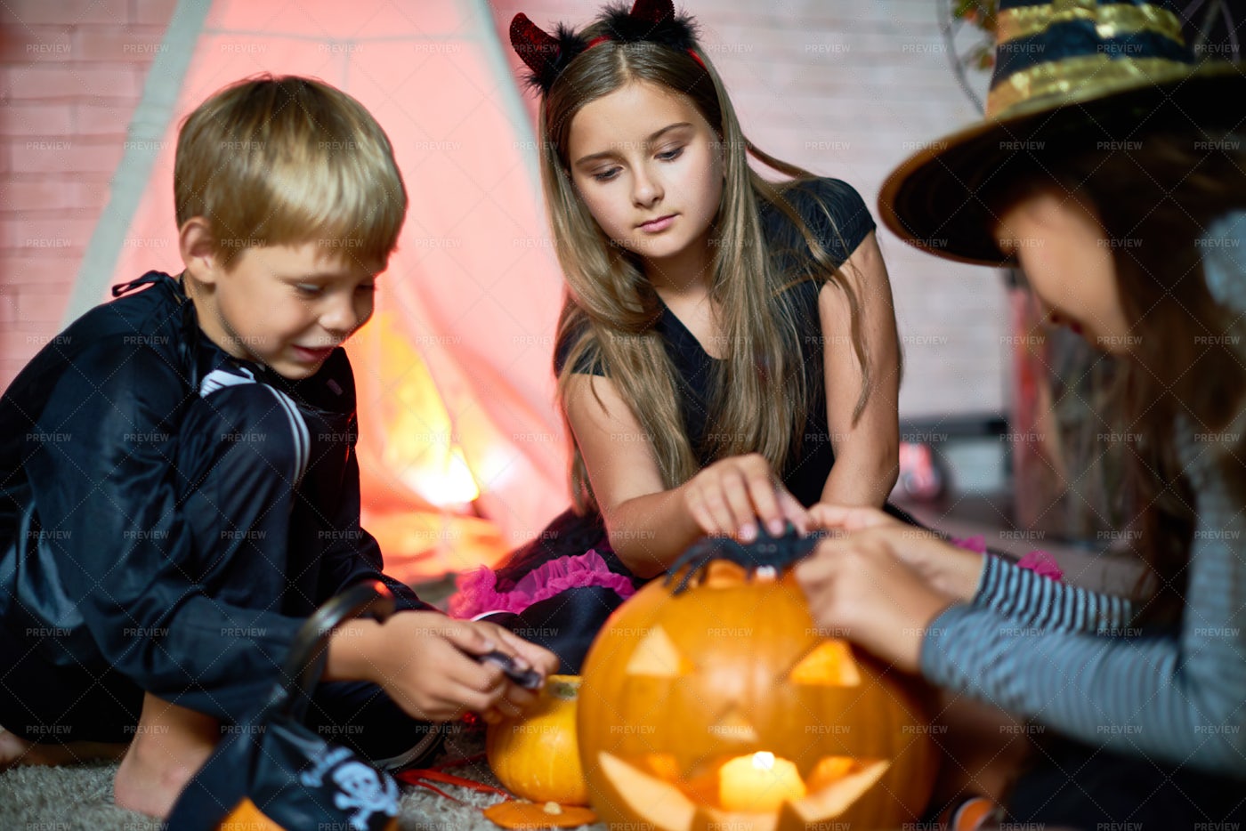 Cute Friends Playing With Halloween...: Stock Photos