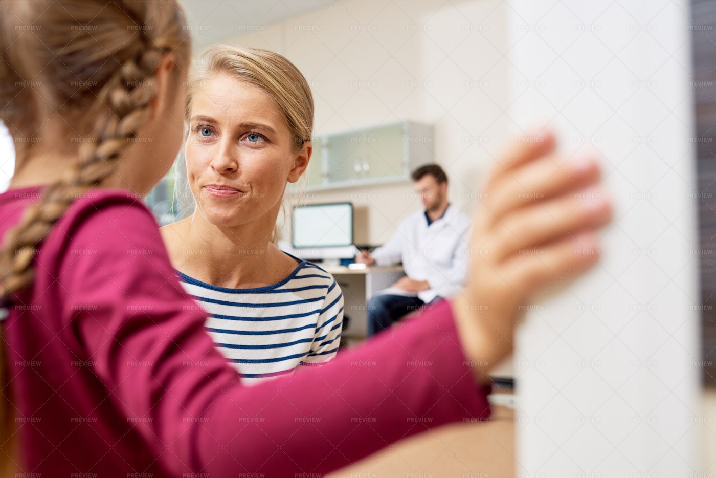 Mother Talking To Scared Little...: Stock Photos