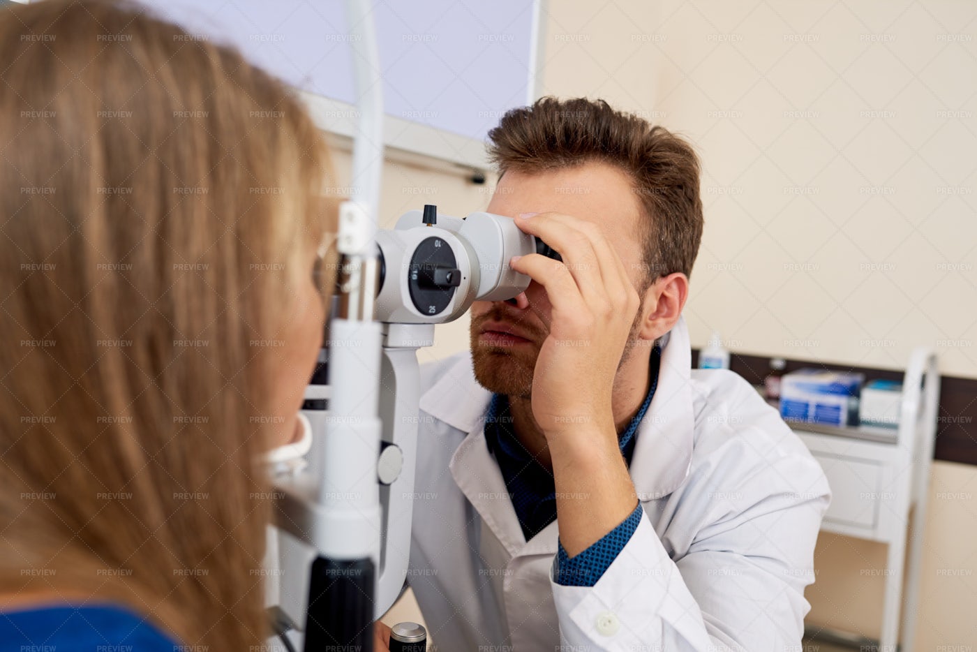 Young Woman Getting Eye Test At...: Stock Photos