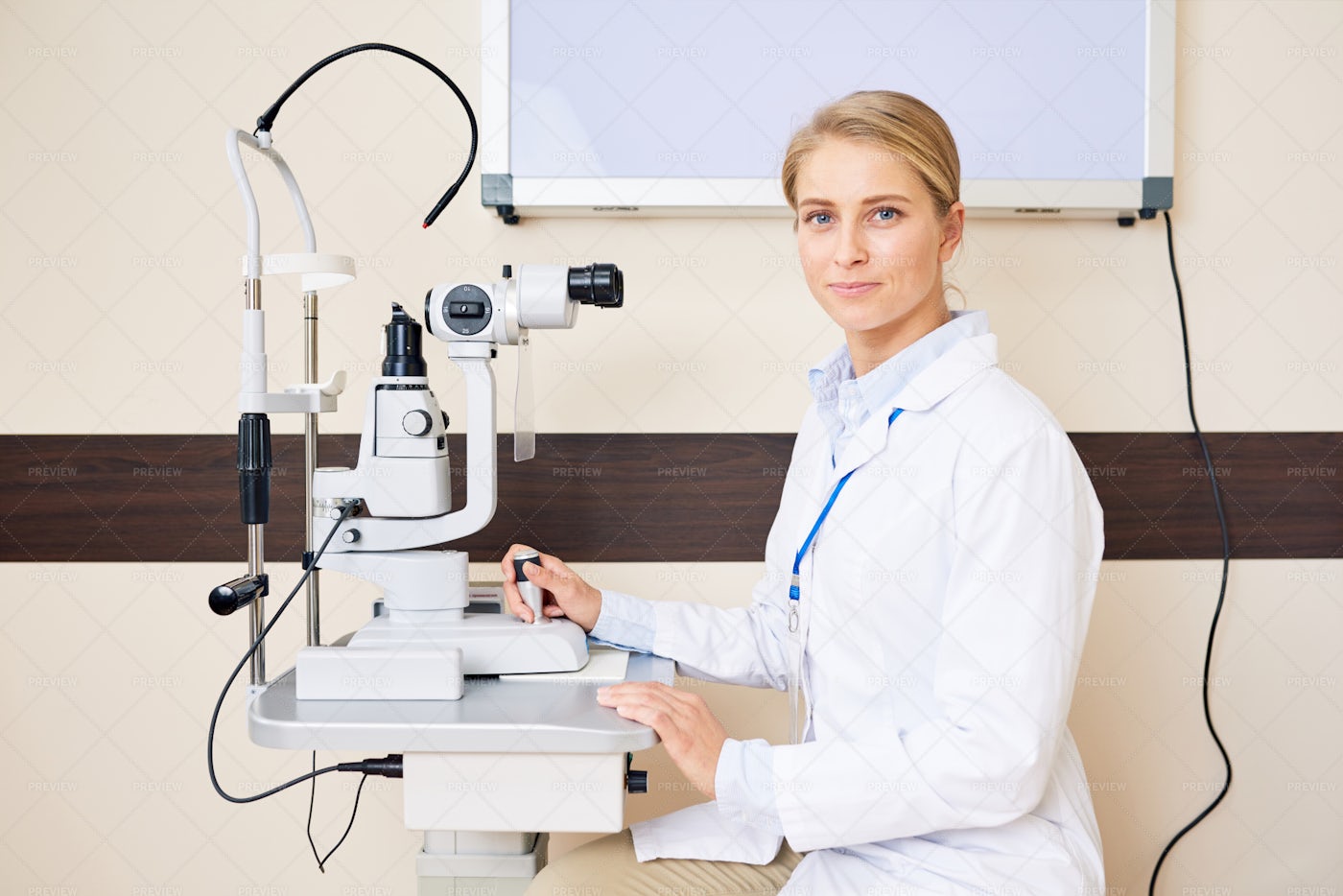 Female Ophthalmologist Posing With...: Stock Photos
