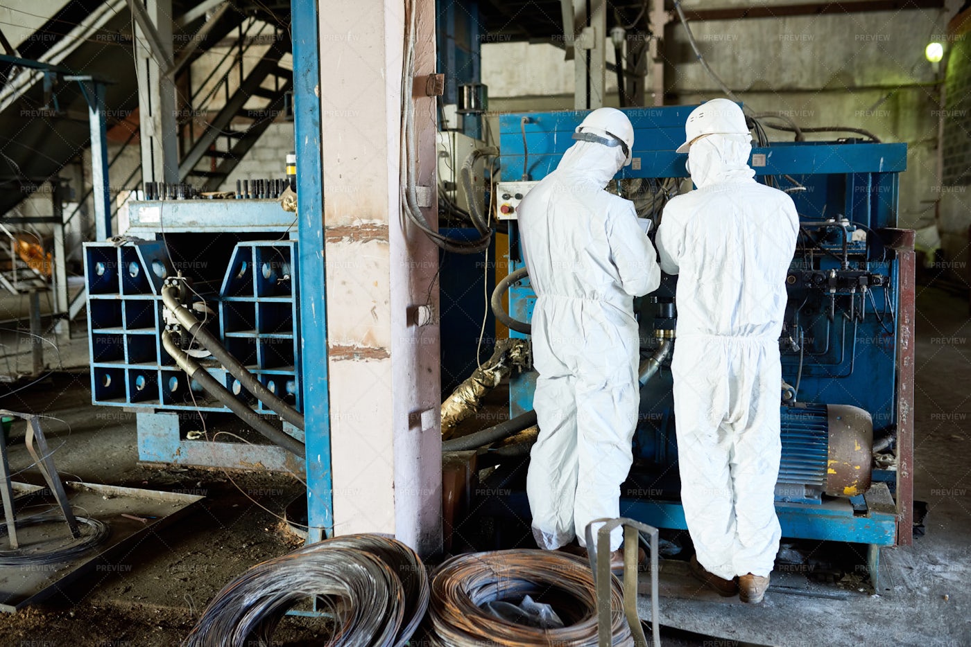 Two Workers On Biohazard Factory: Stock Photos