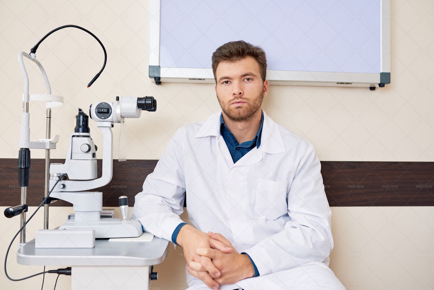 Professional Ophthalmologist Posing... Stock Photos Motion Array