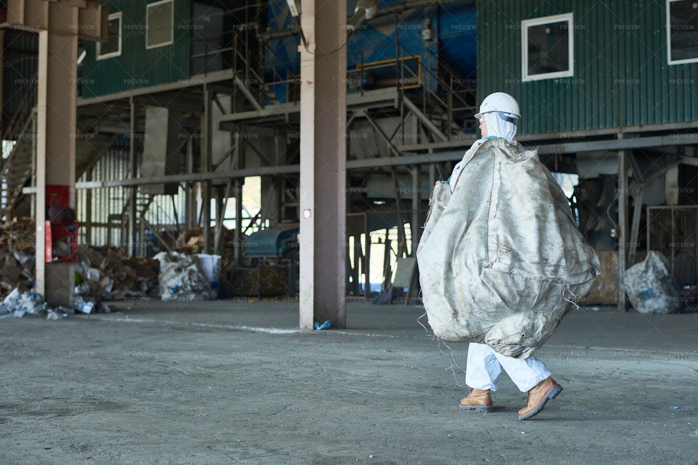 Worker In Warehouse Of Recycling...: Stock Photos