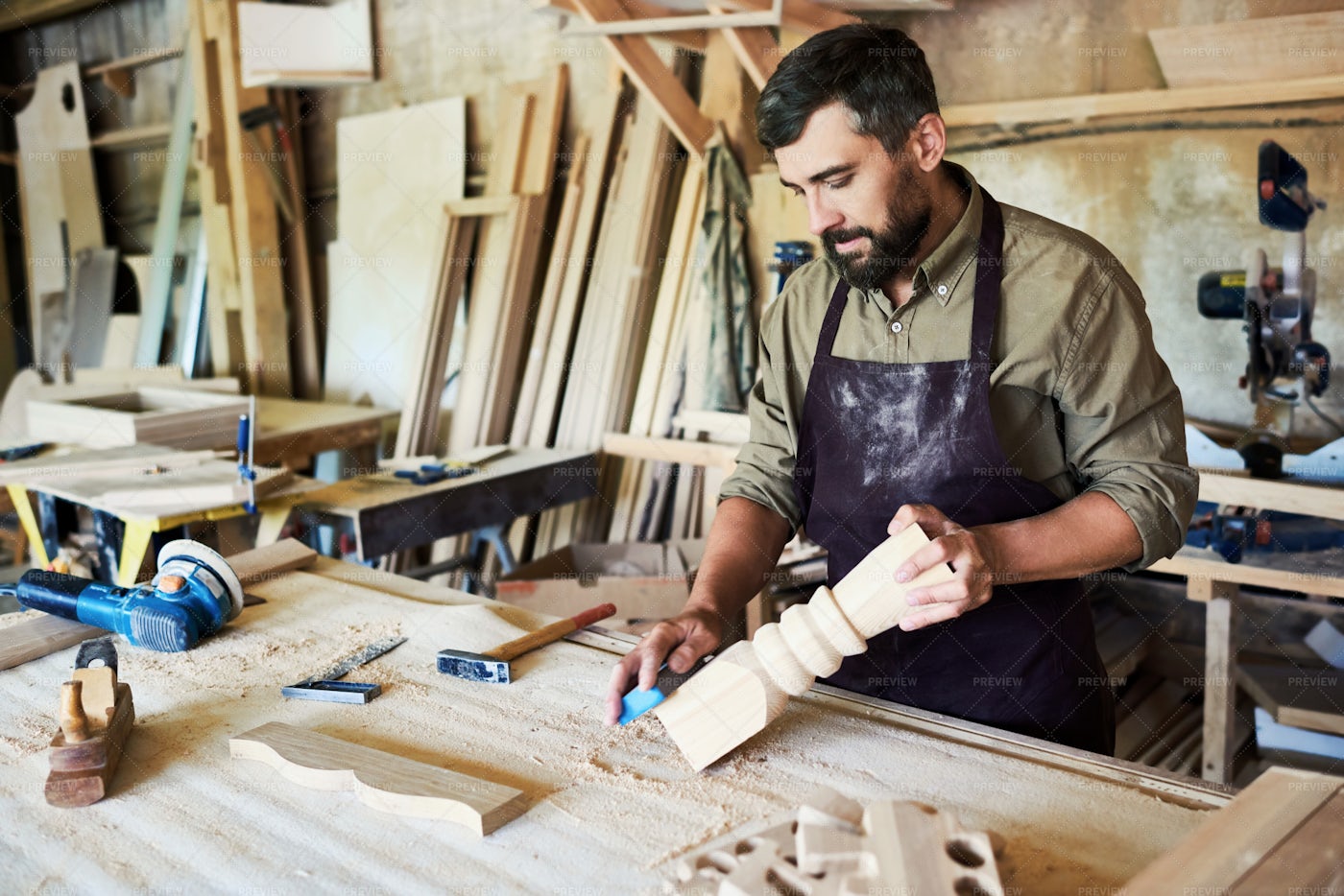 Bearded Carpenter Carving Stair...: Stock Photos