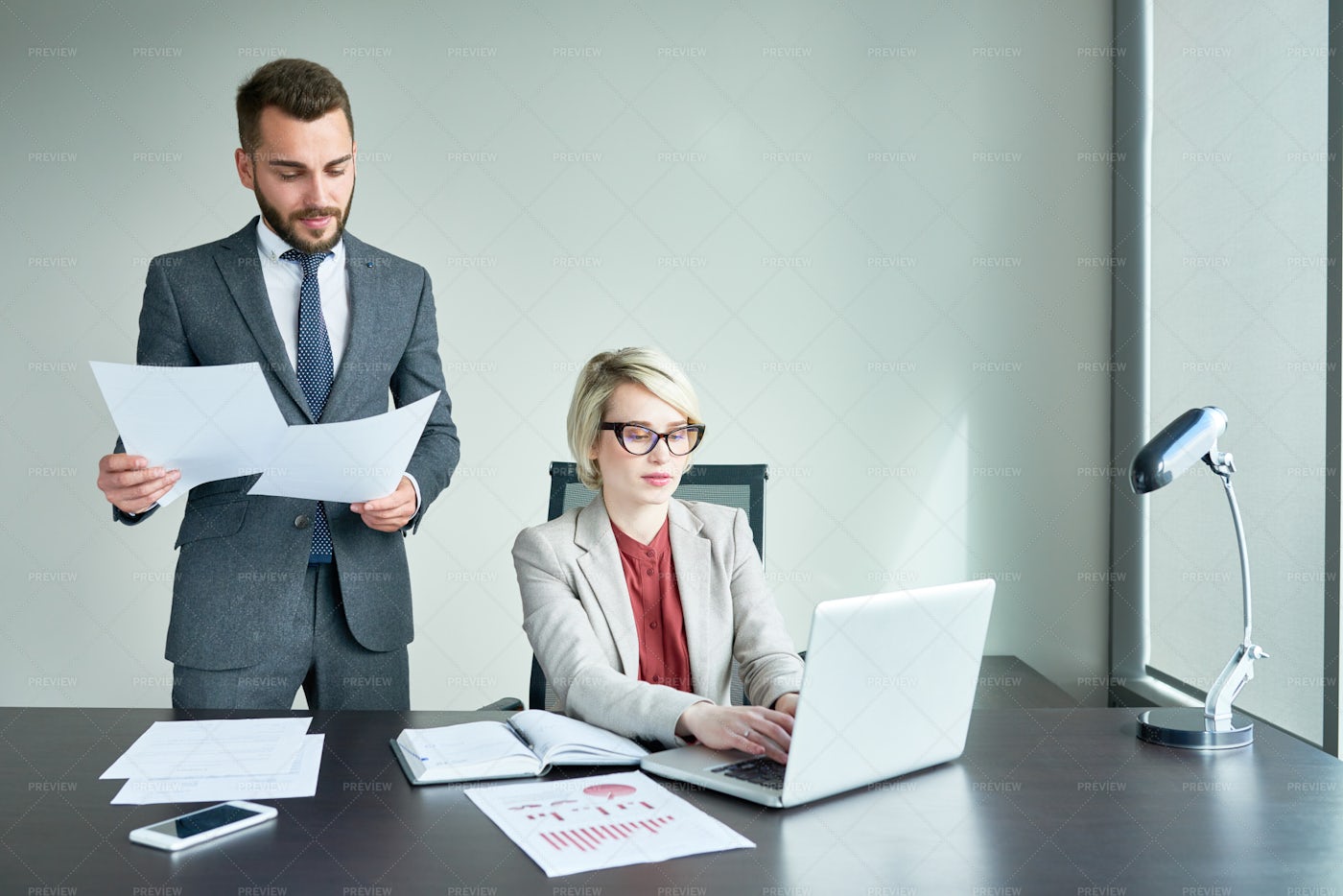 Teamwork At Open Plan Office: Stock Photos