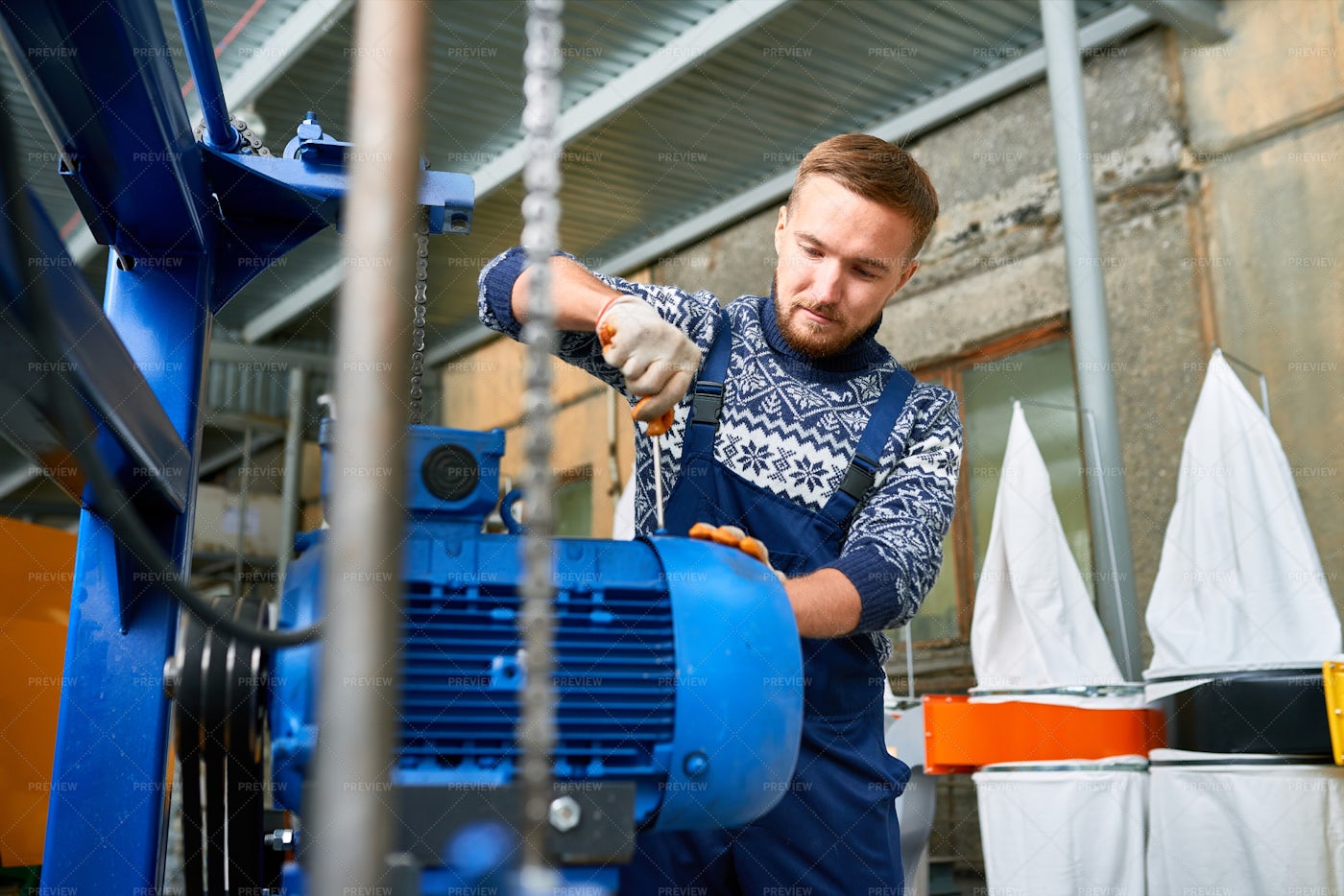 Man Repairing Machine Units At...: Stock Photos
