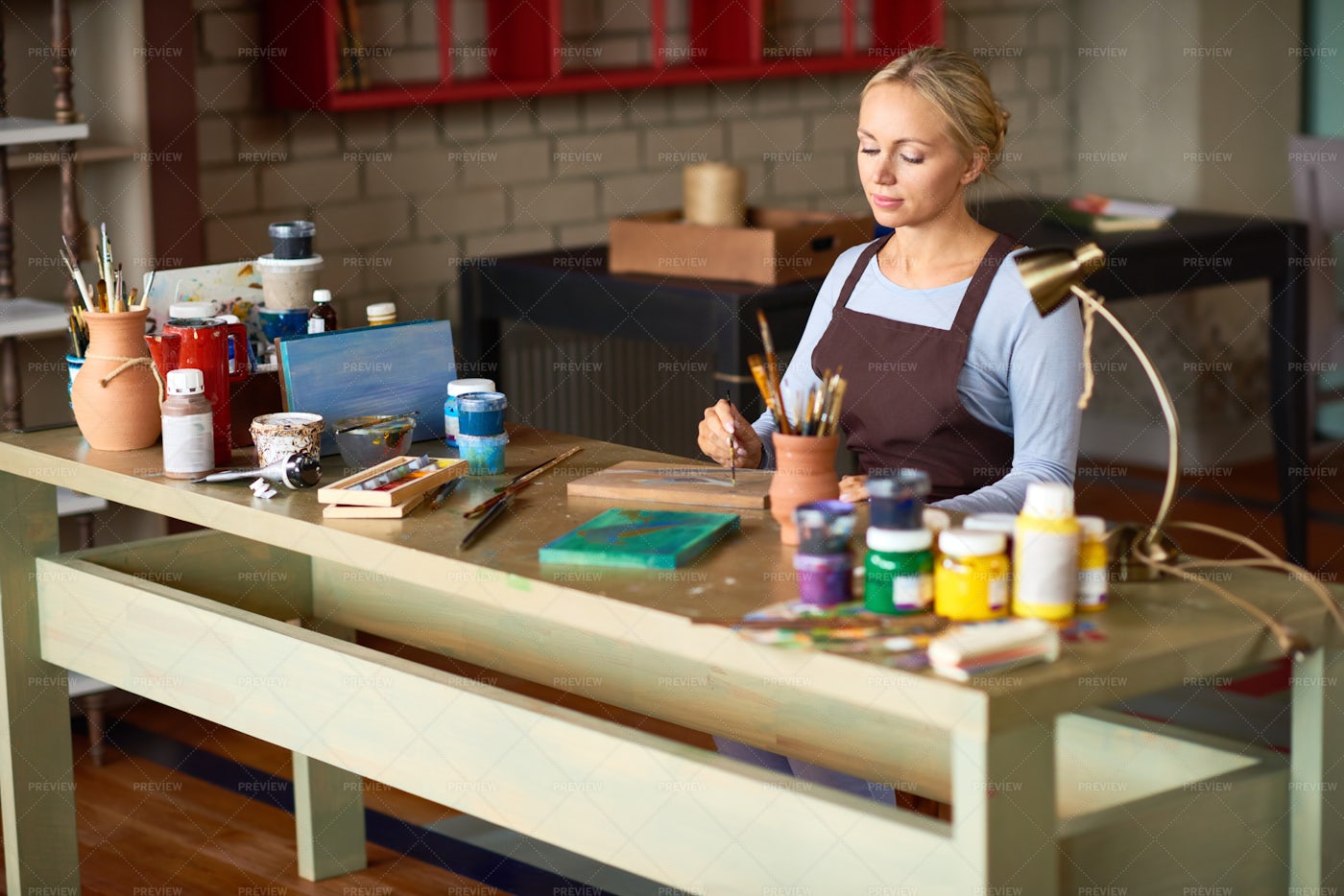 Elegant Young Woman Enjoying Art: Stock Photos
