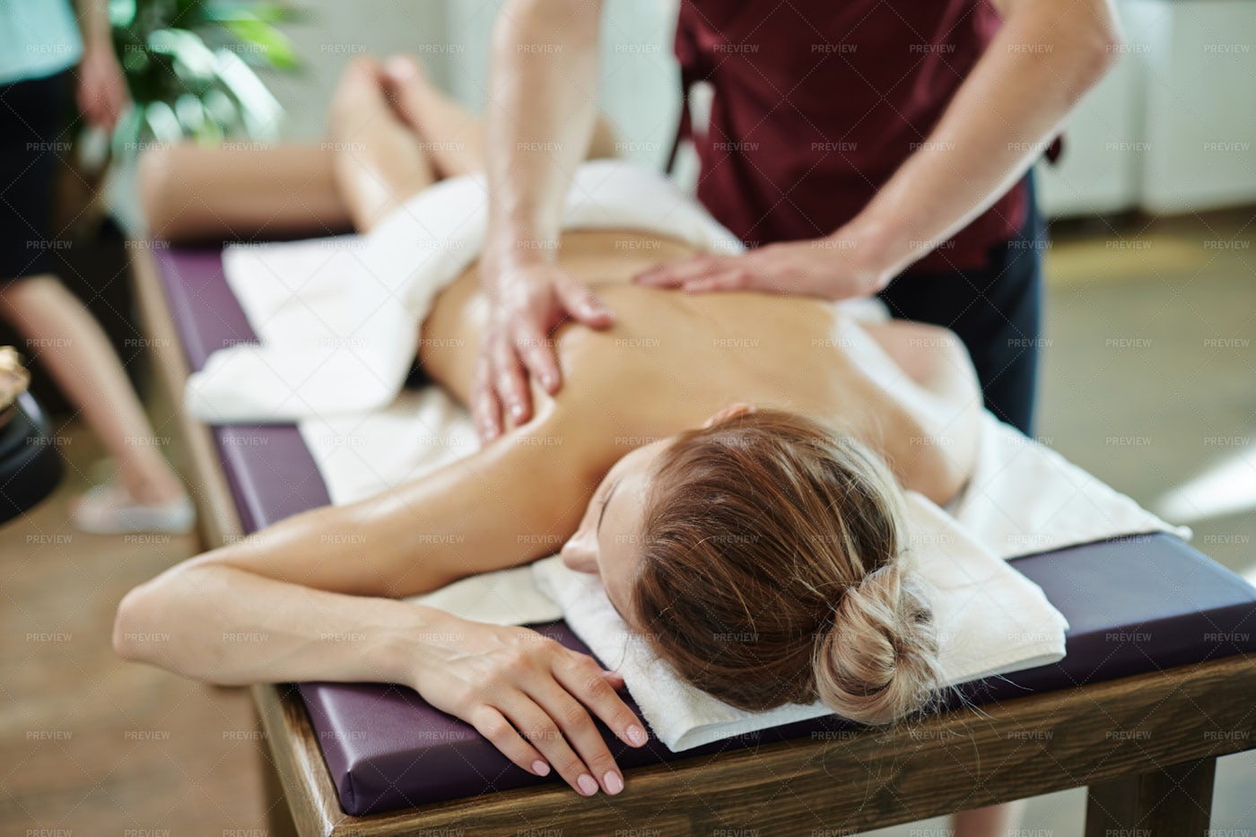 Young Woman Enjoying Massage: Stock Photos