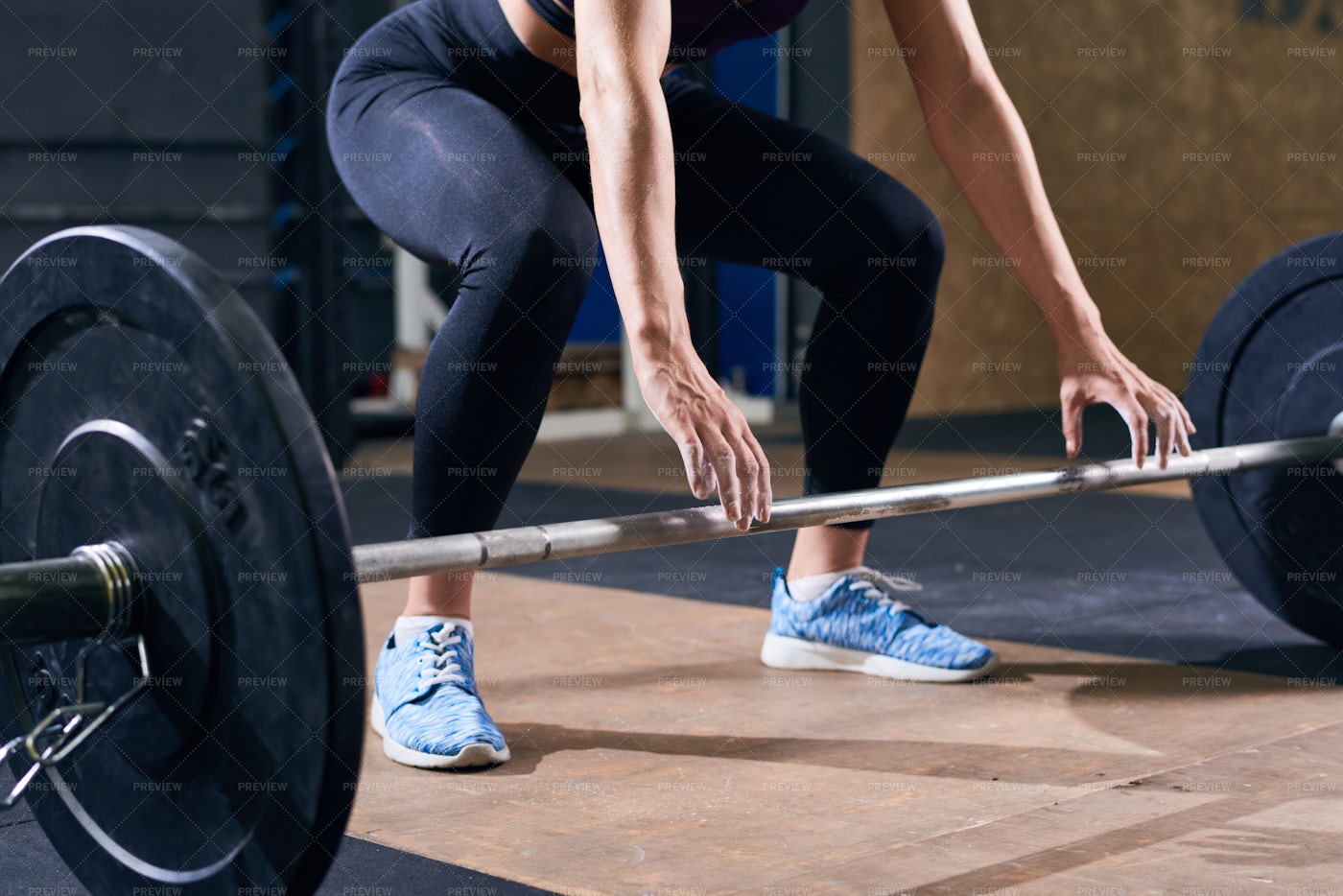 Beautiful Woman Lifting Heavy...: Stock Photos
