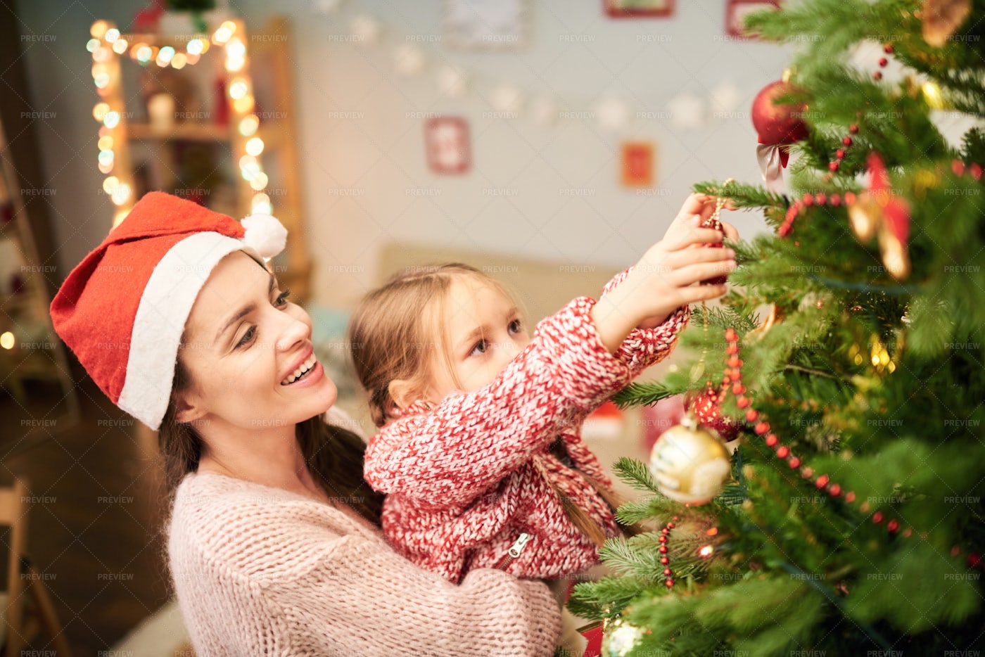 Family Of Two Decorating Christmas...: Stock Photos