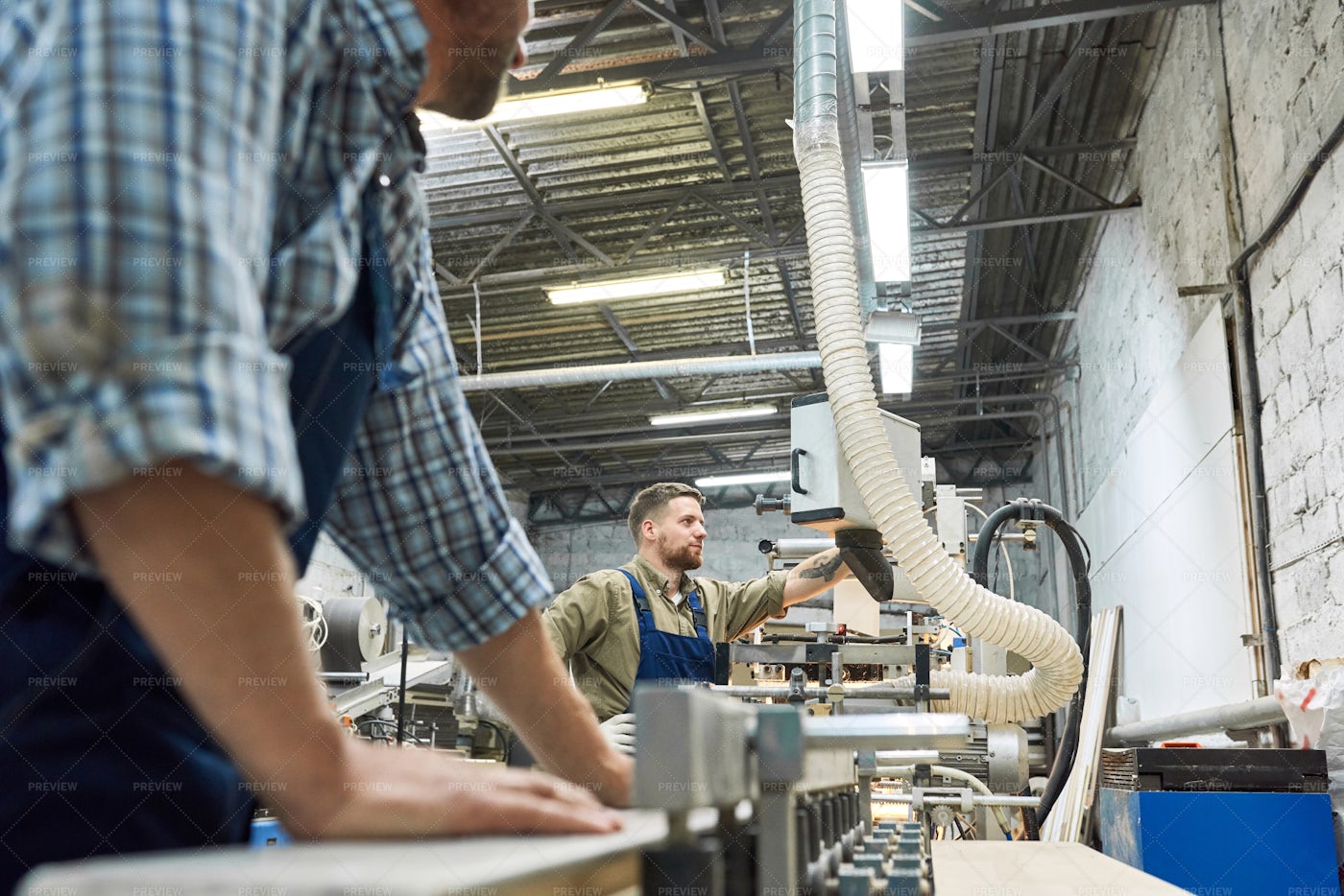 People Working At Modern Factory: Stock Photos
