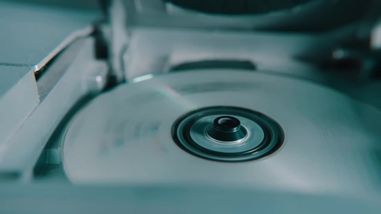 CD Spinning In Player Stock Video Motion Array