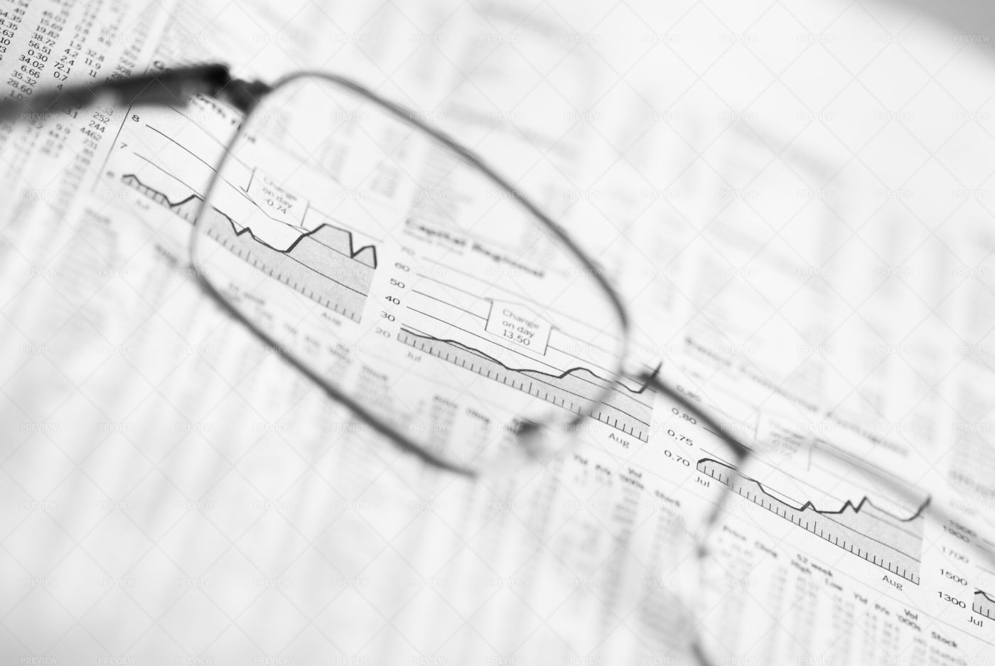 Glasses On Financial Chart: Stock Photos