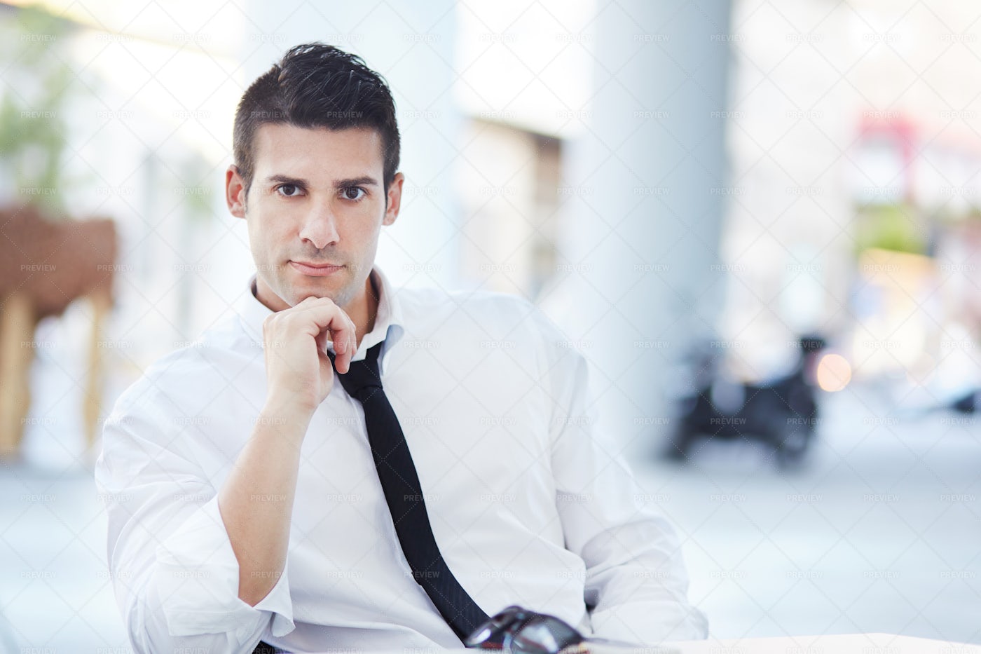 Businessman Takes A Seat: Stock Photos