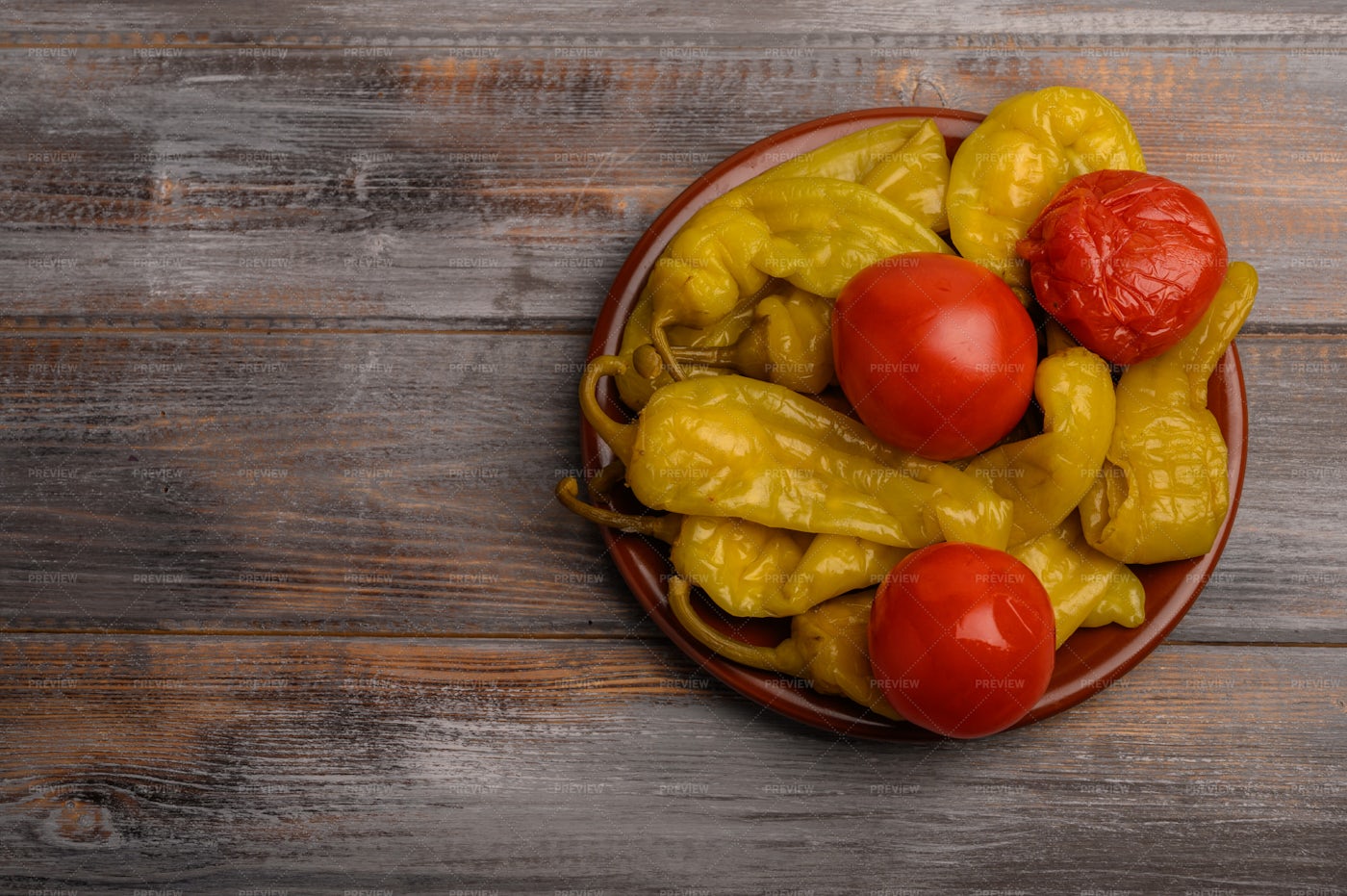 Pickled Peppers And Tomatoes: Stock Photos
