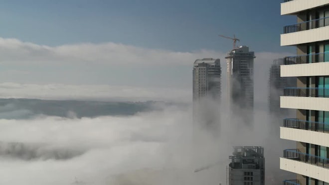 Skyscraper Construction Above The Fog Stock Video Motion Array