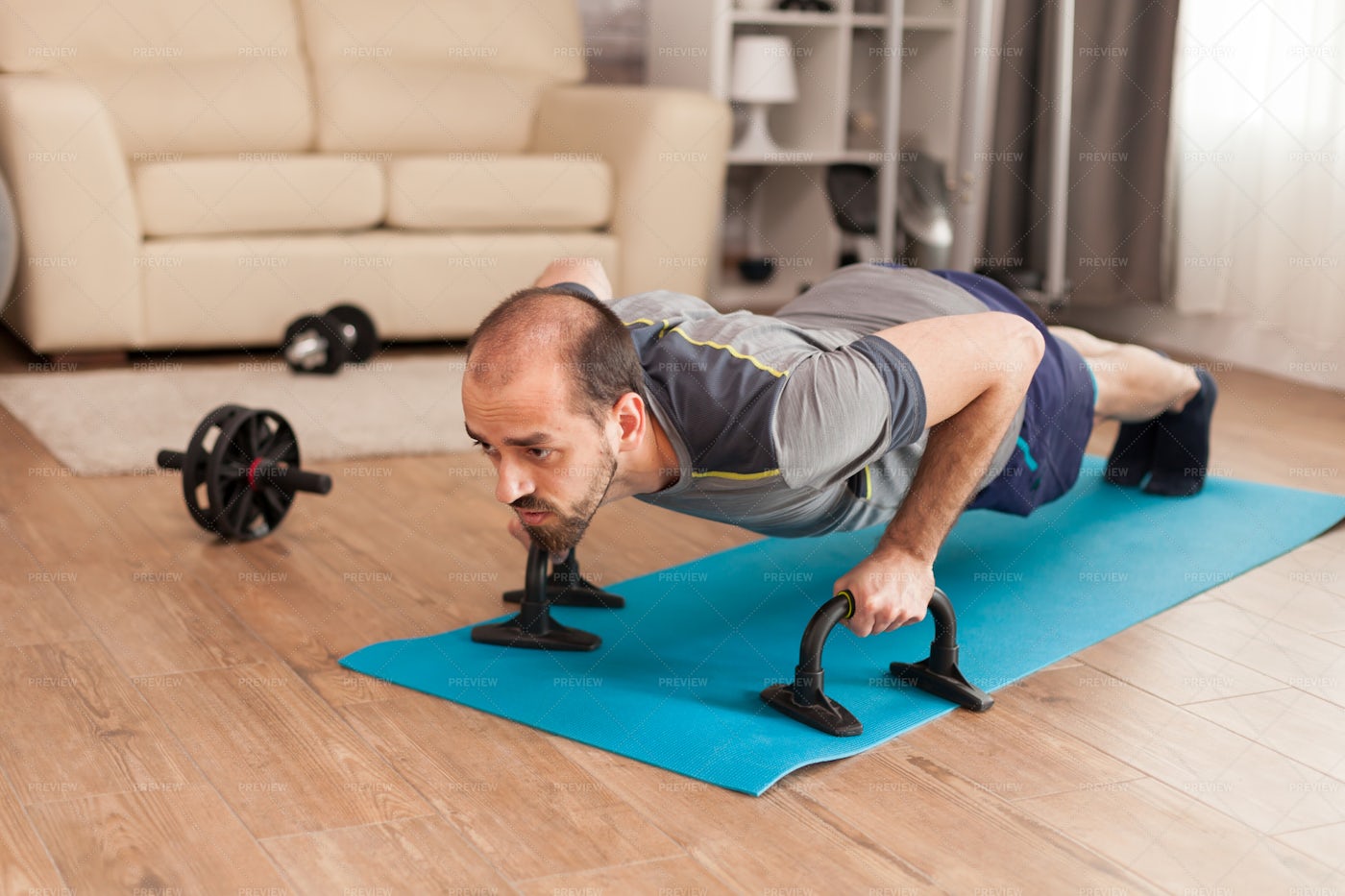 Using Push-Up Bars: Stock Photos