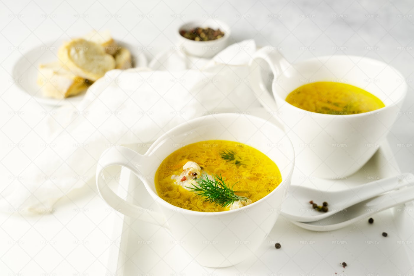 Chicken Soup Served In Cups: Stock Photos