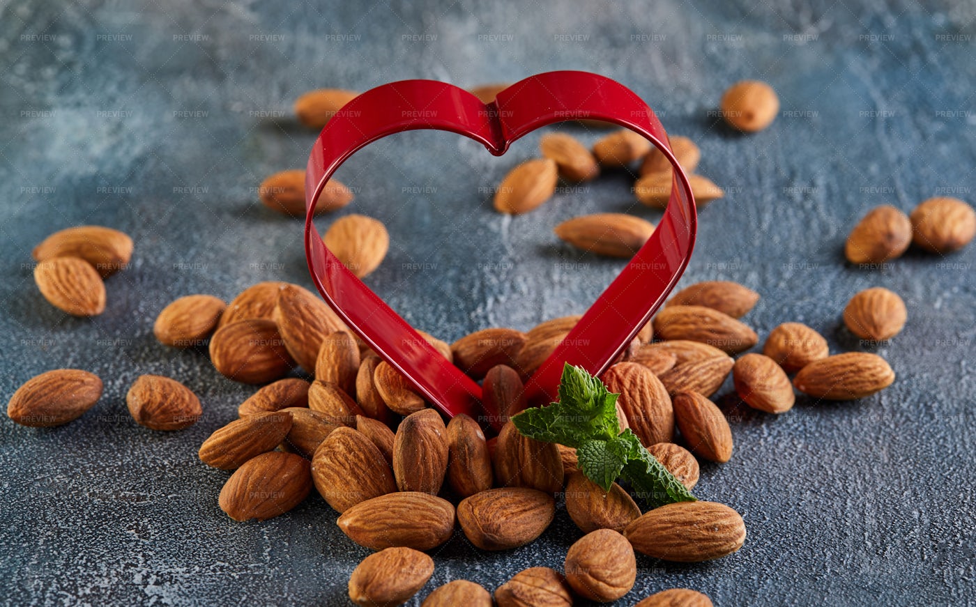 Almonds And A Red Heart: Stock Photos