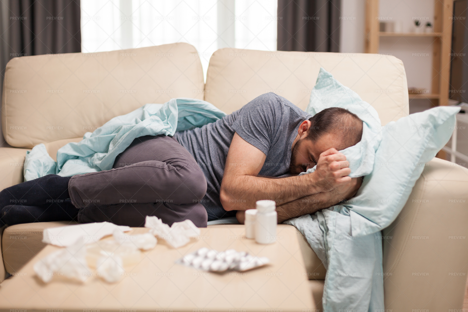 Sick Person In Sofa Stock Photos Motion Array   Preview 615843 QhC3pCA39DFoGchk Large 