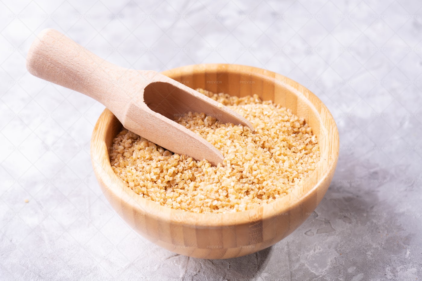 Scooped Bulgur Wheat Grains: Stock Photos