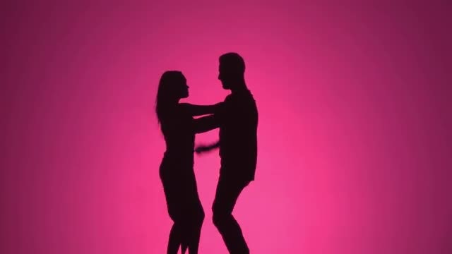 Silhouette Dancers: Stock Video