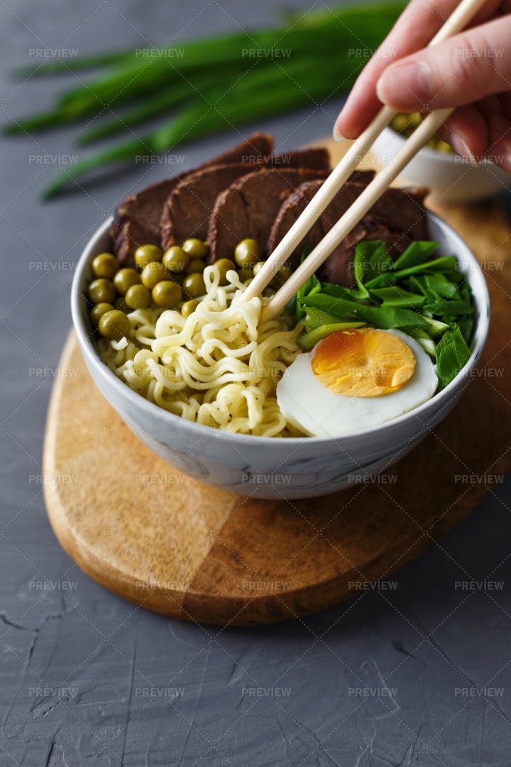 Eating Noodles With Chopsticks: Stock Photos