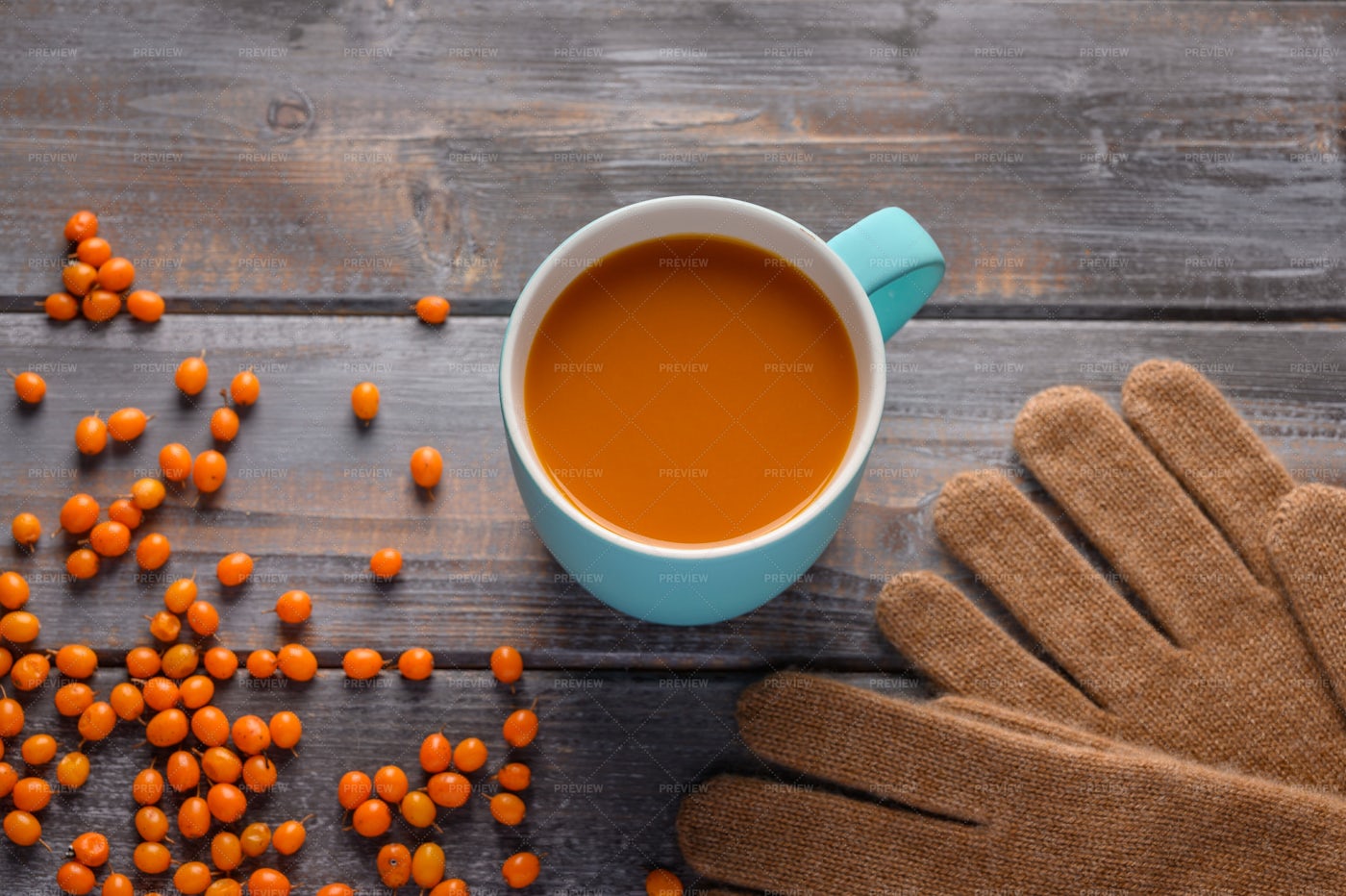 Buckthorn Juice In Mug: Stock Photos