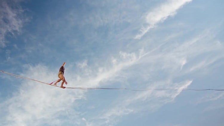 Slackliners in old town: Stock Video