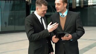 Two Businessmen in Interesting Discussion: Stock Video