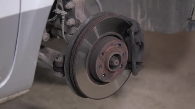 Checking Repaired Car Wheel: Stock Video