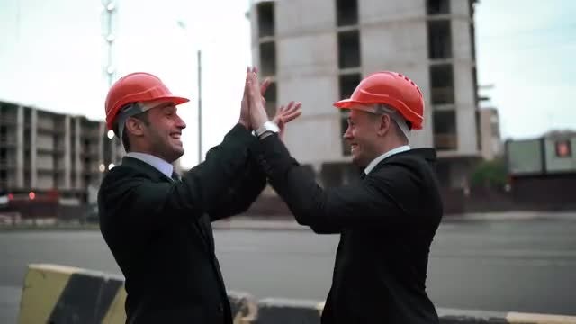 Two Architects High-five: Stock Video