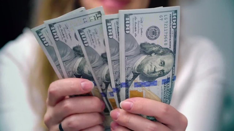 Unsatisfied Woman Counting US Dollars: Stock Video