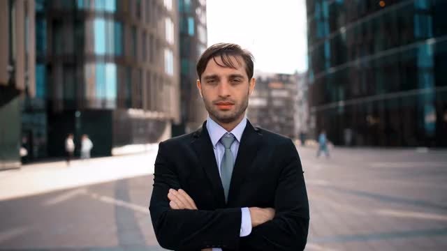Confident Businessman With Crossed Arms : Stock Video