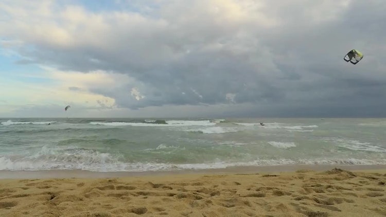 Windsurf And Surf On An Overcast Day: Stock Video