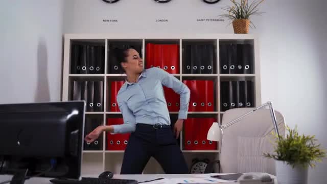 Happy Businesswoman Dances In Office: Stock Video