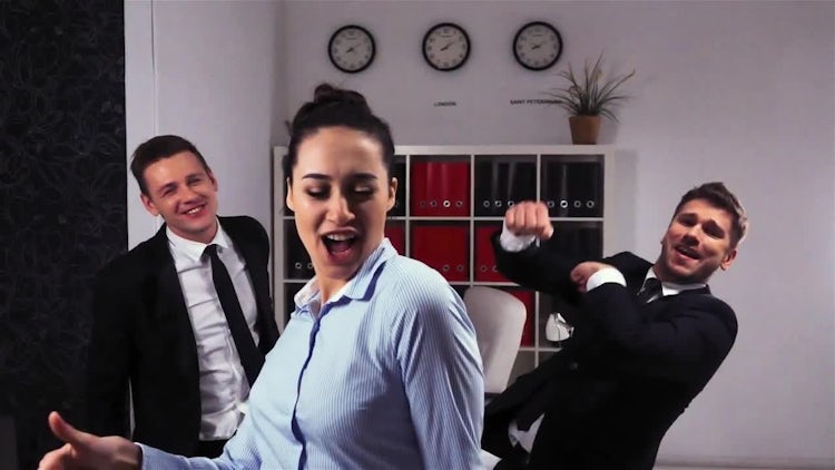 Happy Colleagues Dancing In The Office: Stock Video